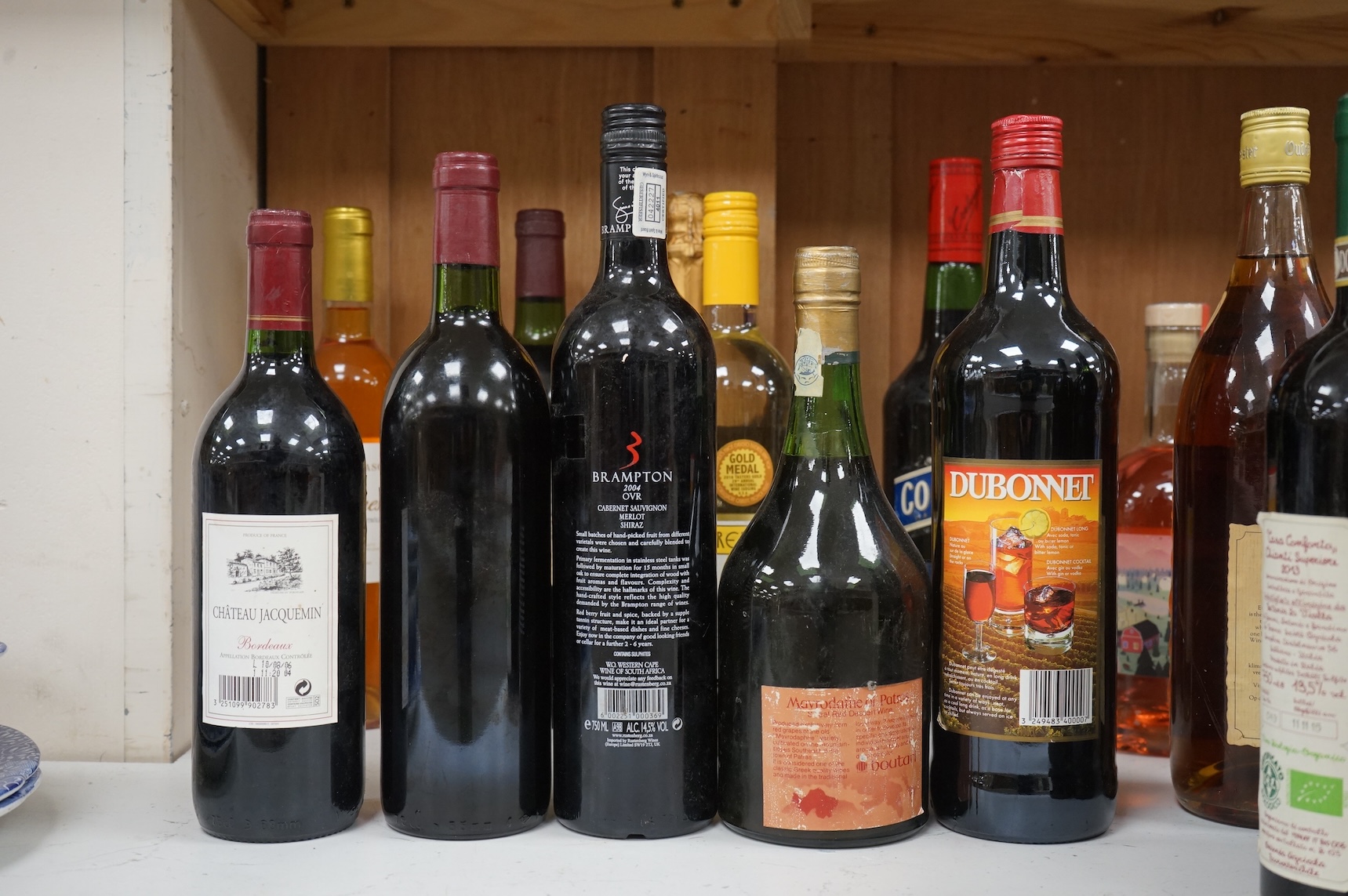 Four bottles Chateau Cauteuate, 1981 together with a group of assorted wines and spirits
